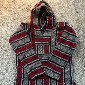 Acrylic poncho red and grey. L. Never worn. Made in Mexico.